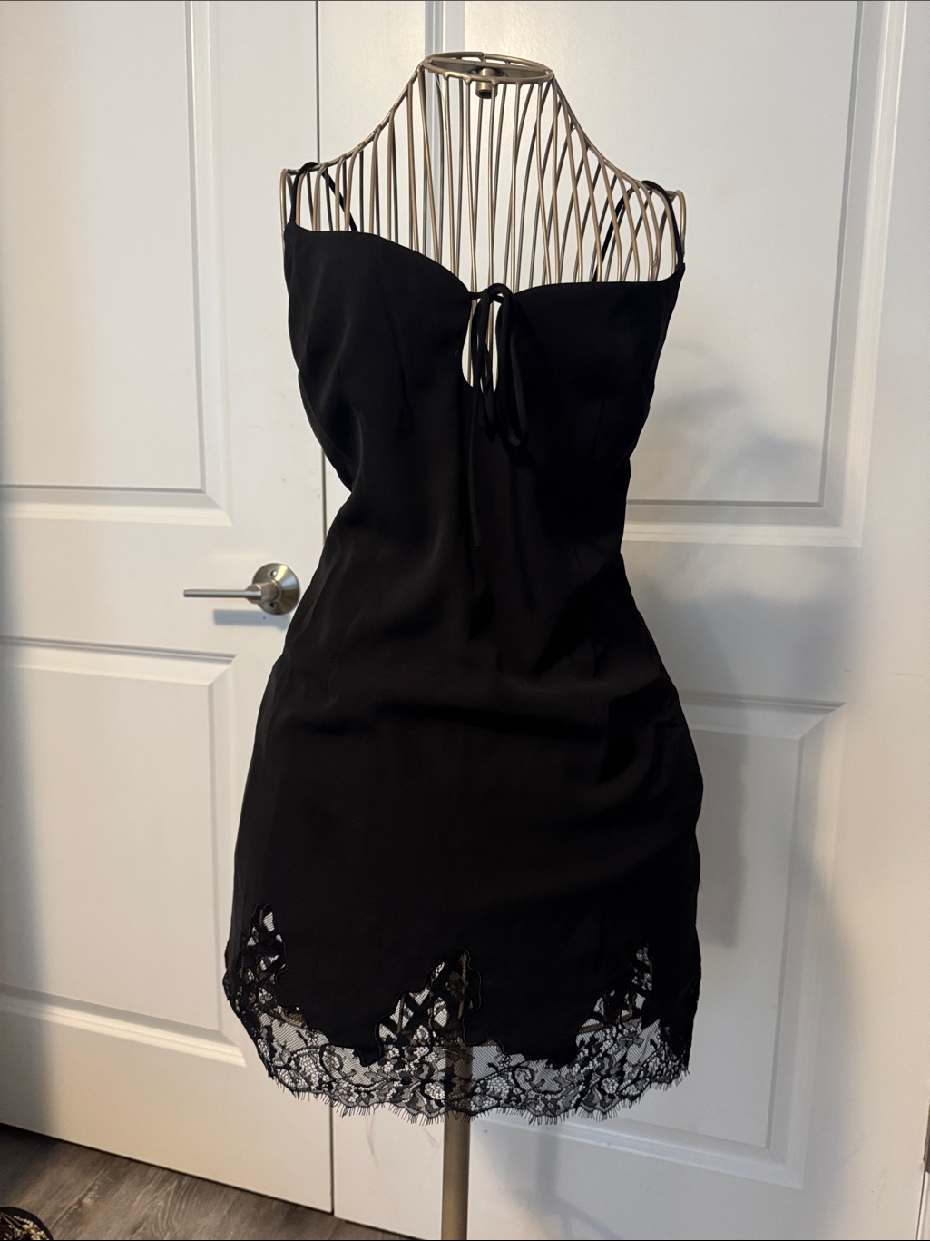 Bobbles And Lace Sleek Black Lace-Trim Mini Dress With Front Tie